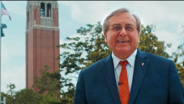 UF President Kent Fuchs standing in front of Century Tower