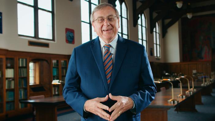 President Fuchs speaks while in the library